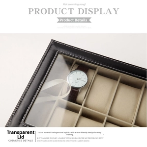 Detail of black leather watch box featuring white stitching and transparent glass lid