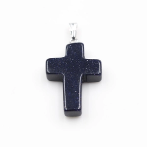 Detailed close-up of blue sandstone cross pendant with polished silver clasp finish