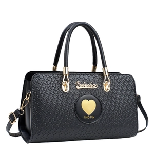 Classic black woven texture handbag with golden heart hardware and crossbody strap