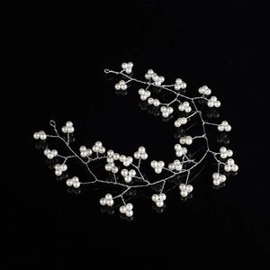 Elegant 30cm bridal hairband with white pearls and silver wire vines on black surface