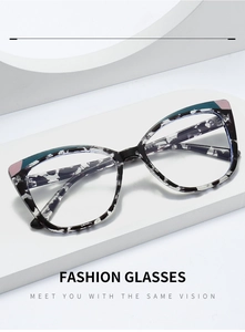 Detailed macro of cat-eye frames showing TR90 texture and vibrant contrast corner accents