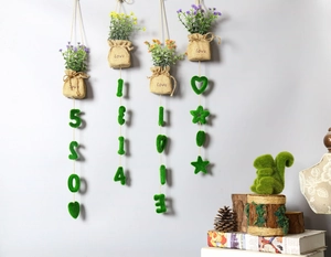 Hanging artificial plants in burlap bags with love text for wall home decoration