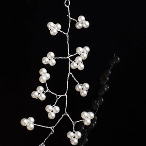 Handmade bridal hairband with white pearls and silver wire in a branch design on black