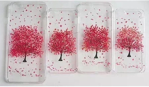Clear phone cases featuring pink flowering tree designs and petals on a white background
