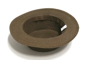 Macro detail of dark brown paper straw hat interior with 100% paper material label