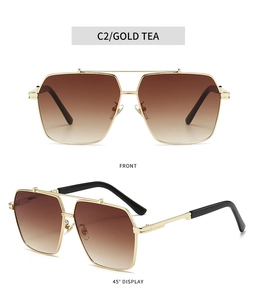 Detail view of square gold metal sunglasses with double bridge and tea gradient lenses