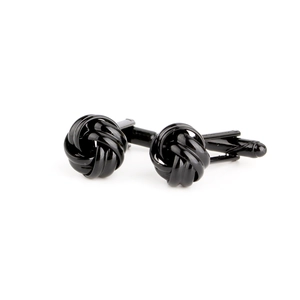 Pair of elegant black silk knot cufflinks in polished metal for men's formal shirts
