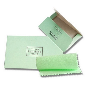 Light green silver polishing cloth with decorative serrated edges and matching envelope sleeve