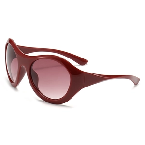 Futuristic Y2K oversized red sunglasses with bordeaux gradient lenses for cycling sport
