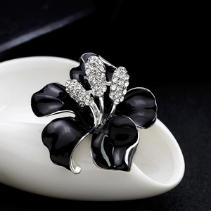 Exquisite black enamel rose brooch with crystal rhinestones on a silver metal base