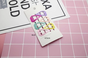 Detailed view of 6-piece colorful heart-shaped metal hair clips with 4.5cm size markings