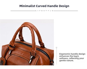 Detail view of the brown vintage leather handbag showing the curved handle and metal hardware