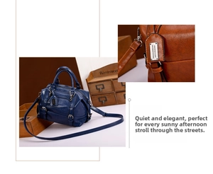 Detail view of vintage crocodile texture Boston bag with durable handles and metal zip