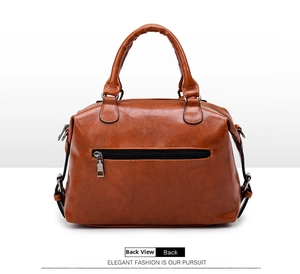 Detailed back view of vintage brown leather tote with zipper pocket and lychee texture