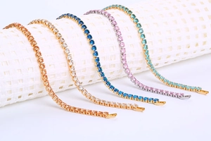 Detail of five multi-colored micro-pave tennis bracelets with prong-set cubic zirconia