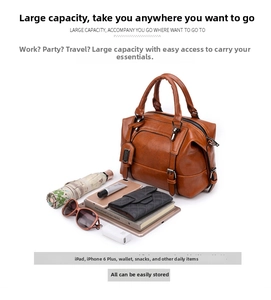 Detail view of brown vintage tote bag capacity showing iPad, phone and daily essentials