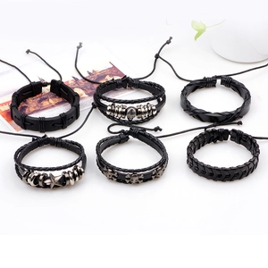 Six-piece set of black genuine leather punk bracelets featuring skull and star charms