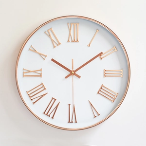 Modern 12-inch wall clock with rose gold frame and 3D Roman numerals on white dial