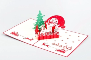 3D pop-up Christmas card featuring laser-cut reindeer, sleigh, and tree scenes