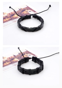 Detailed view of black braided leather bracelet with adjustable drawstring closure cord