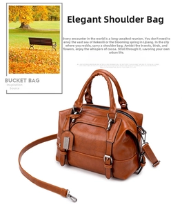 Close-up of crocodile pattern texture and metal buckle on brown PU shoulder bag