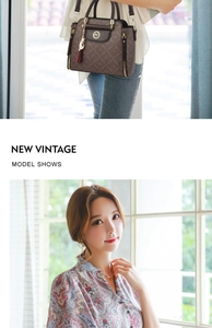 Detail view of vintage dark brown tote bag with logo pattern and cat pendant