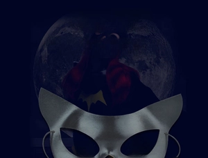 Detail of silver catwoman mask showing sleek texture and pointed cat ear design