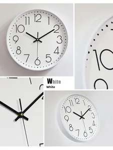 Detailed views of a 12-inch modern white wall clock with black 3D numerals and slim hands