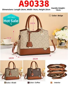 Detail view of stylish tote bag showing multi-compartment interior and logo pattern