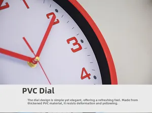 Close-up of modern round wall clock featuring a red frame and durable PVC dial material