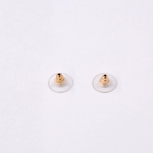 Pair of clear silicone ear nuts with golden metal core for large earring support