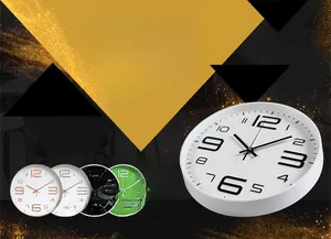 Detail view of silent wall clock available in white, rose gold, black, green, and red
