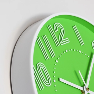 Modern minimalist 12 inch round wall clock with 3D numbers and bright green dial face