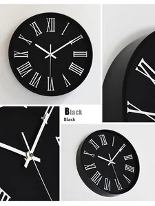 Détail de l'horloge murale noire de 30 cm avec finition mate et chiffres romains