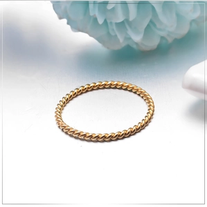 Elegant minimalist gold twisted rope ring for women made of durable stainless steel