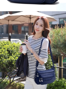 Blue soft leather shoulder bag with multi-layer zipper pockets for women in street style