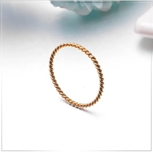 Elegant gold twisted rope stainless steel ring in minimalist spiral design for women