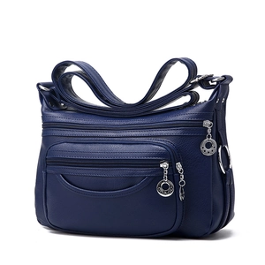 Dark blue soft leather multi-pocket shoulder bag with adjustable strap and star charms