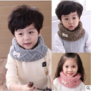 Chic cable knit winter snood for children in grey, brown, and pink color options