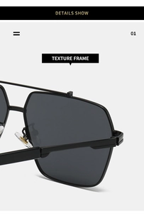Close-up of black aviator sunglasses showing texture frame and clear silicone nose pads
