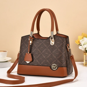Oumifei monogram crossbody bag for women with leather handles and gold hardware