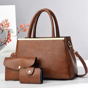 Elegant 3-piece brown leather tote bag set including handbag, clutch and card holder