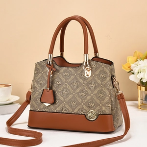 Elegant brown leather crossbody bag for women with beige floral print and top handles