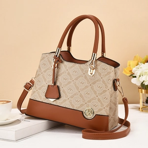 Elegant brown and beige monogram shoulder bag with gold hardware for women