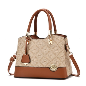 Elegant brown and beige monogrammed women's handbag with gold hardware and shoulder strap