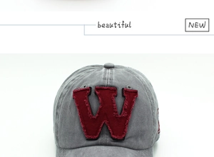 Close-up of gray cotton baseball cap featuring high-quality red embroidered letter W detail