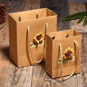 Kraft paper gift bags with decorative sunflowers and rope handles in two different sizes
