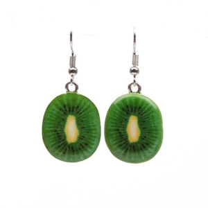 Detail of creative kiwi slice dangle earrings with realistic resin texture and silver hooks