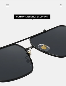 Close-up of adjustable silicone nose pads and knurled metal frame on square sunglasses
