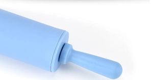 Close-up of light blue silicone rolling pin with ergonomic handle for baking dough